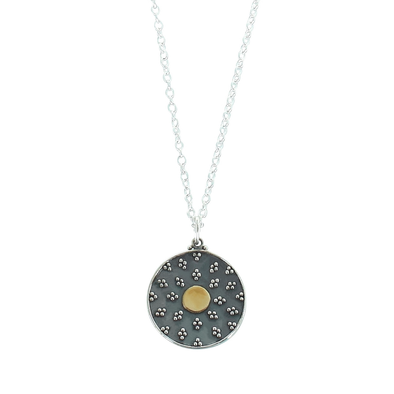 Round disc with bronze circle in middle necklace
