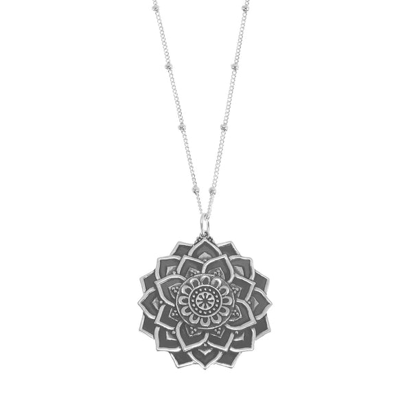 Sterling silver mandala necklace on white background