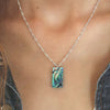 Paua rectangle necklace on neck