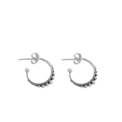 Sterling silver hoops on white background