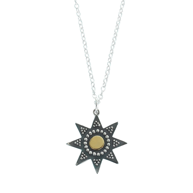 Star necklace on white background