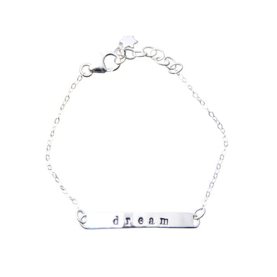 Sterling Silver hand stamped bracelet with the word dream.