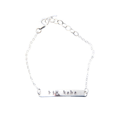 Sterling Silver hand stamped bracelet with the word kia kaha.