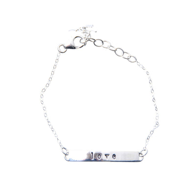 Sterling Silver hand-stamped bracelet with the word love.