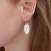 Paua & White Mussel oval shell earrings on Sterling silver sleeper hoops