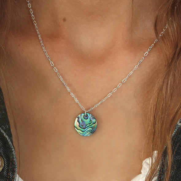 Round Paua Necklace on neck.