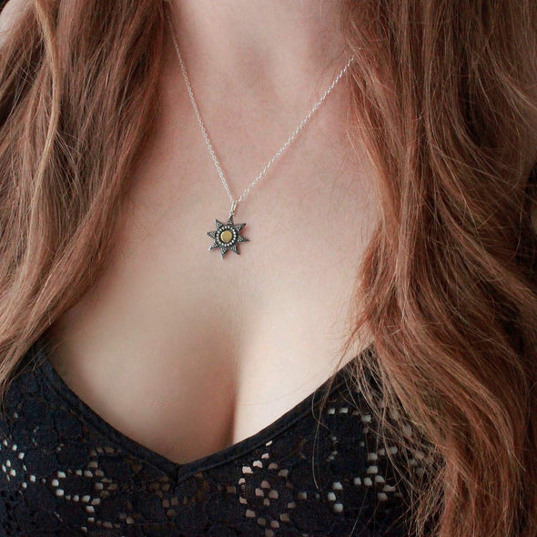 Star necklace on model