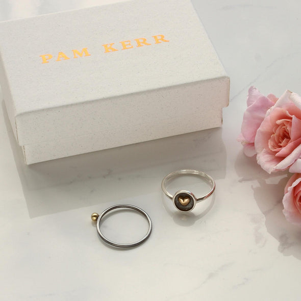 heart & sphere rings next to Pam Kerr jewellery box