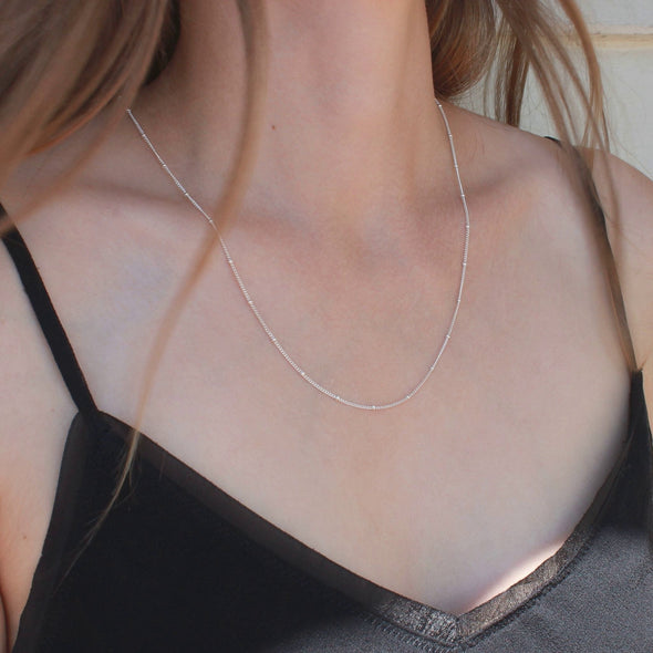 Sterling silver chain necklace on model