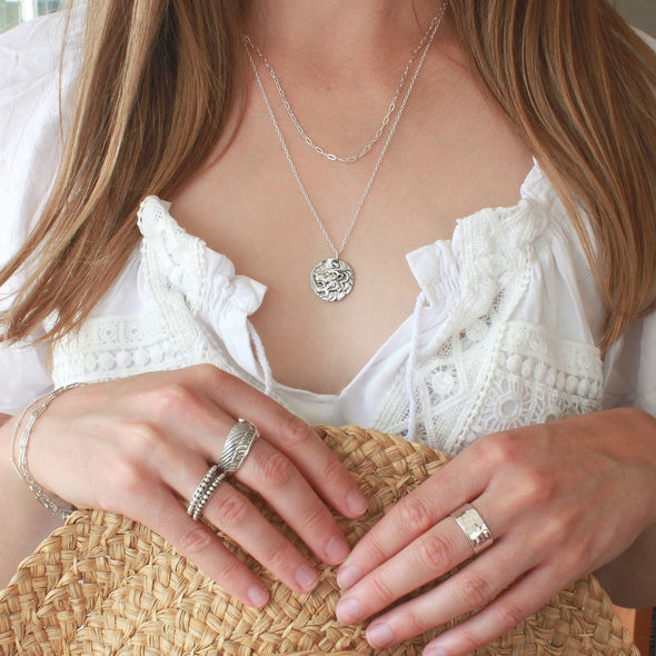 sterling silver rings and lion necklace
