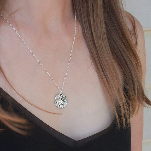 Sterling Silver Lion pendant necklace on model neck