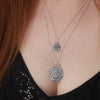 Sterling silver mandala layered necklaces on model