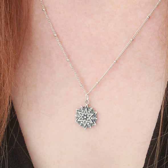 Sterling silver mandala 'inspiration' necklace. on neck.